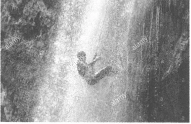 Original example photograph of abseiling beside a waterfall